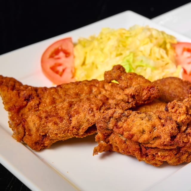 Bistec Empanizado - Breaded Steak.