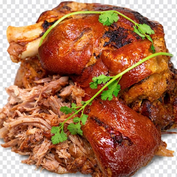 Close-up of a large piece of roasted pork with crispy skin, shredded pork, and cilantro garnish.