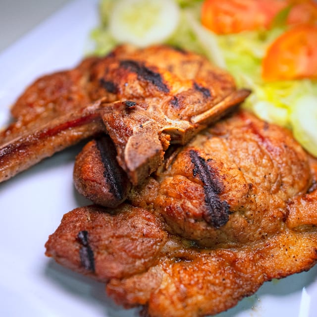 Chuletas Fritas - Fried Pork Chops.
