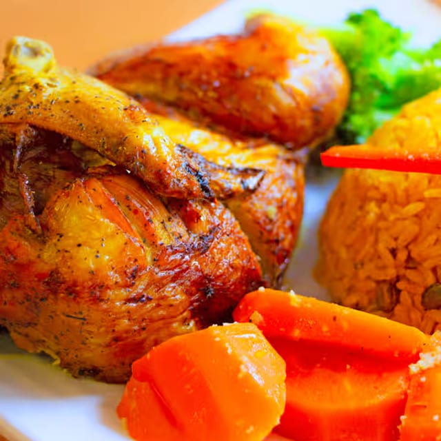 Family Combo (Whole Rotisserie Chicken + Pork Chops, Rice-peas Or White Rice-Beans; Or Sweet Plantains) 2 Liter Soda.