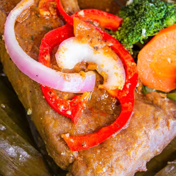 Pasteles en Hoja / Stuffed Mashed Green Plantain.